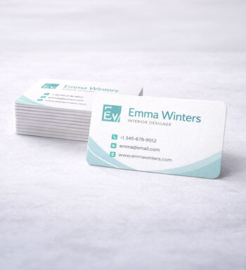 A stack of business cards with rounded corners for a softer look.