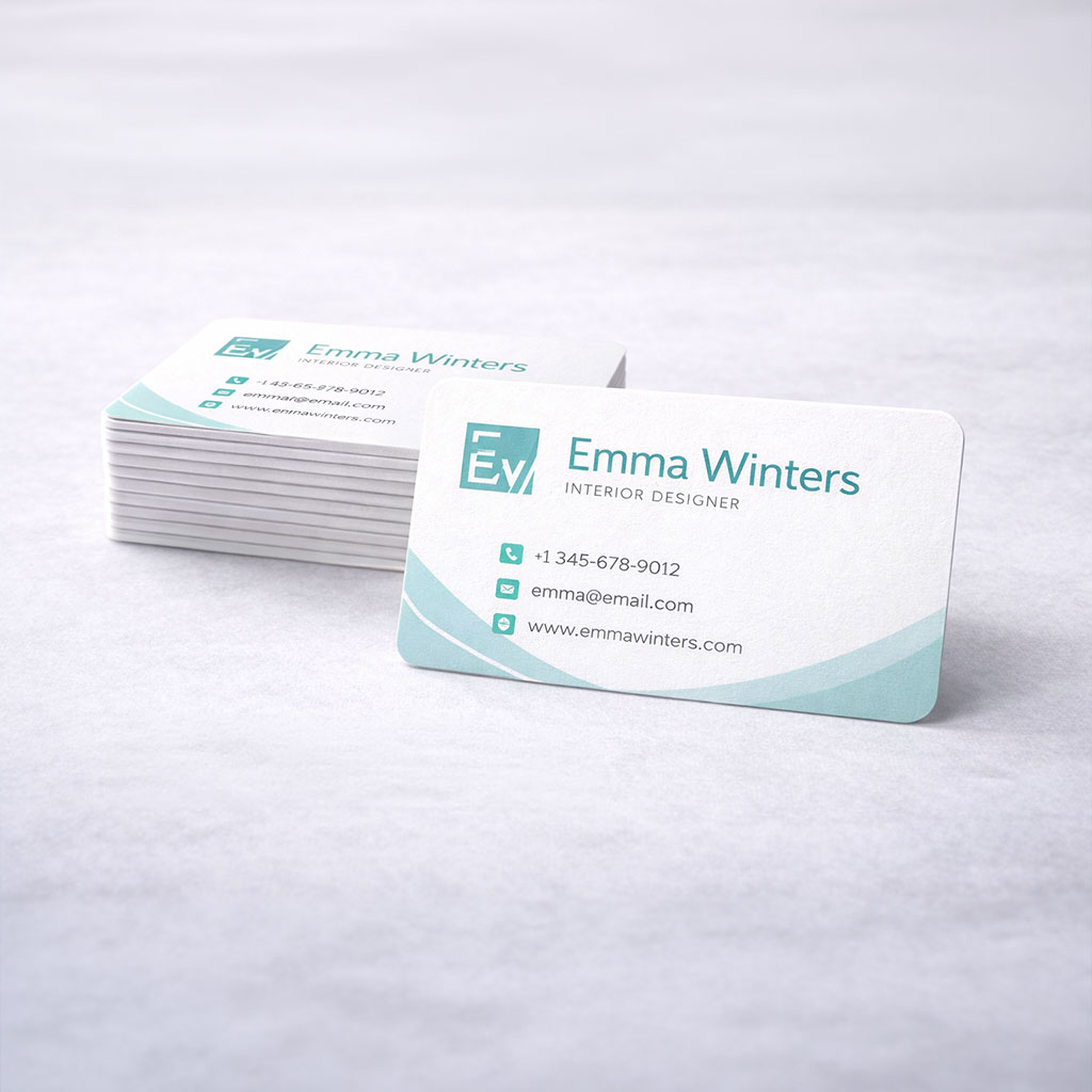 A stack of business cards with rounded corners for a softer look.