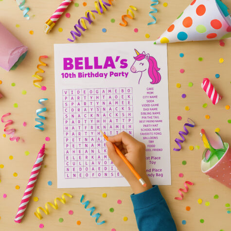A child playing a word search for a kids birthday party.