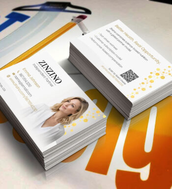 A stack of Zinzino Business Cards laying on a table.